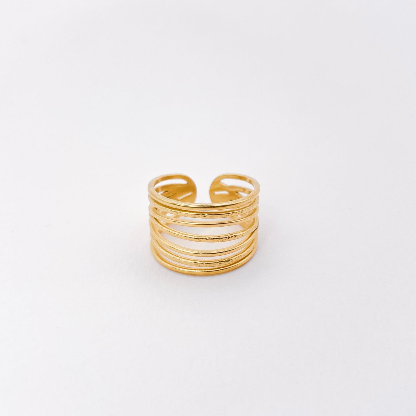 bague multirangs doré en acier inoxydable, 7 anneau x en 1. légère et ajustable. Bijoux tendance à prix doux