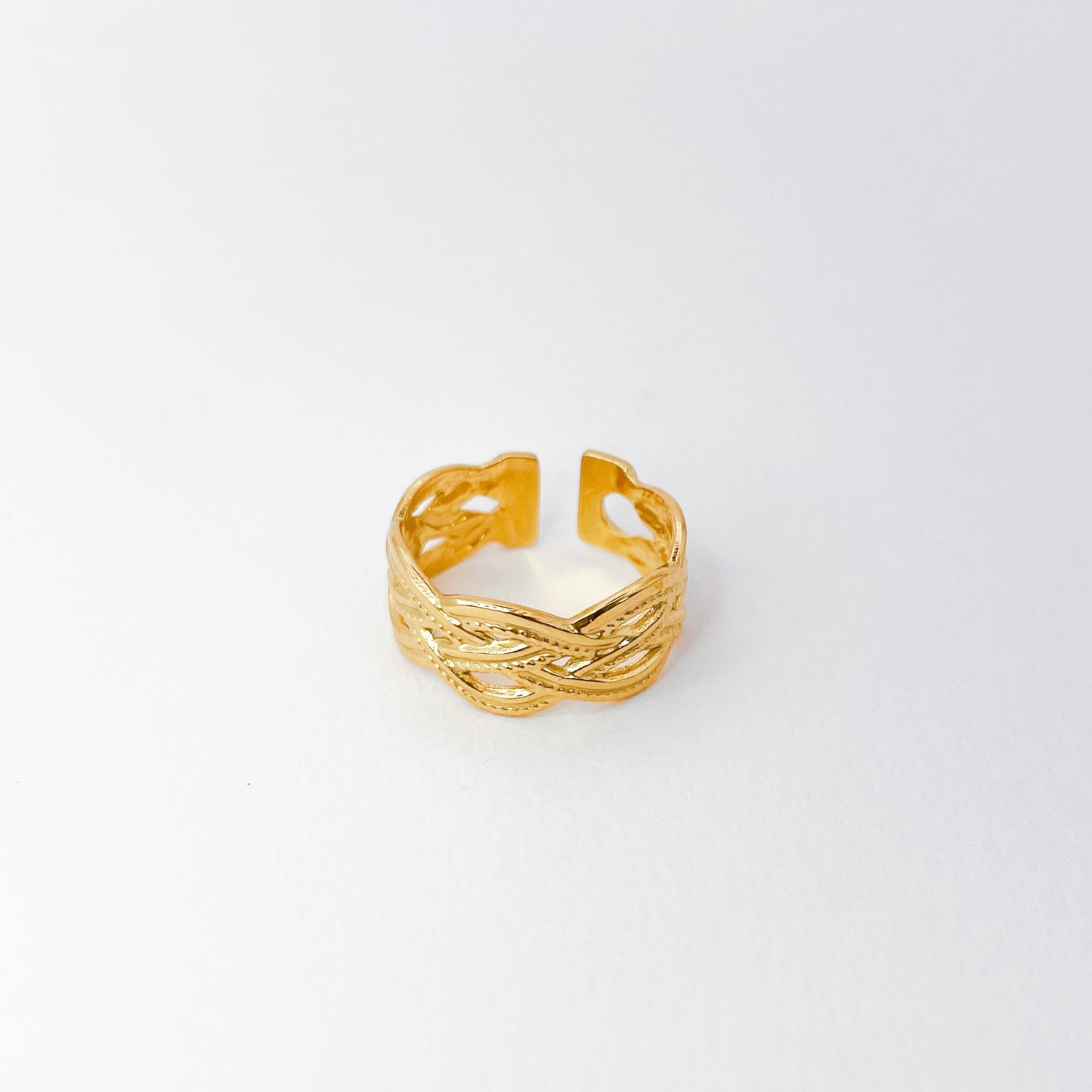 bague tressée et texturée en acier inoxydable dorée. agustable et waterproof