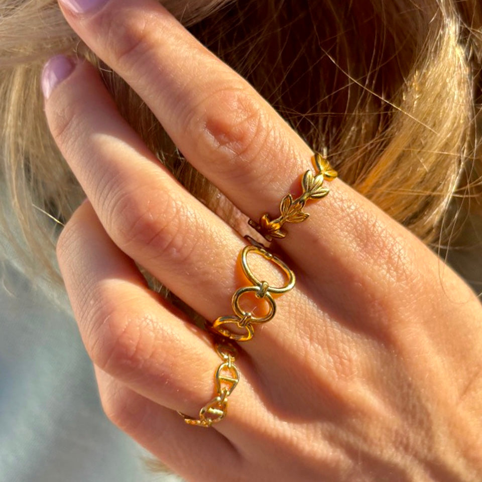 bague dorée au design feuillage. acier inoxydable de qualité, ajustable et petit prix
