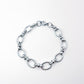 bracelet à gros maillon argenté en acier inoxydable. Chic et tendance